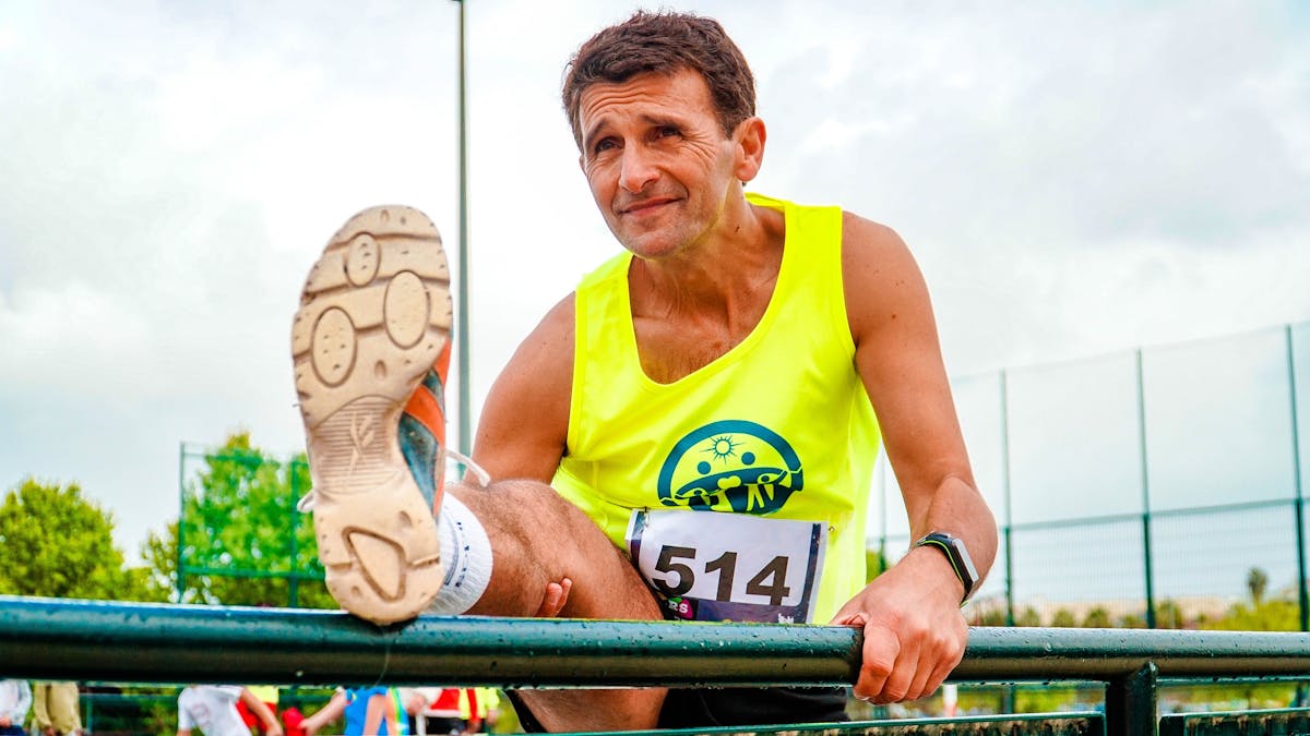 Runner stretching during a recovery day
