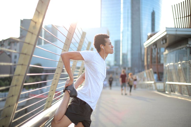 Runner stretching before a workout
